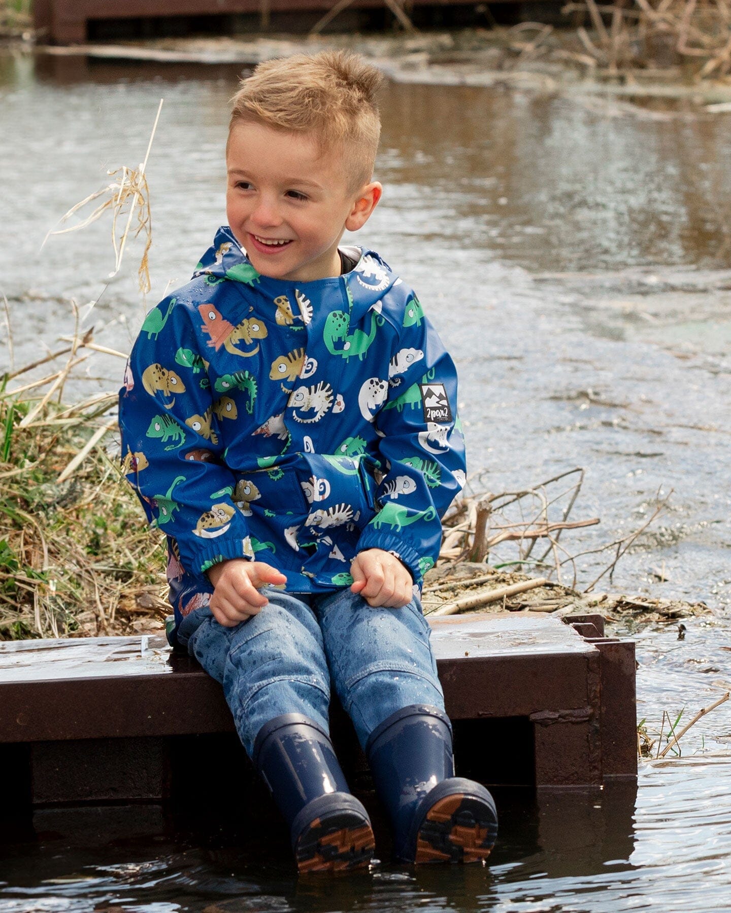 Blue raincoat with color-changing chameleon
