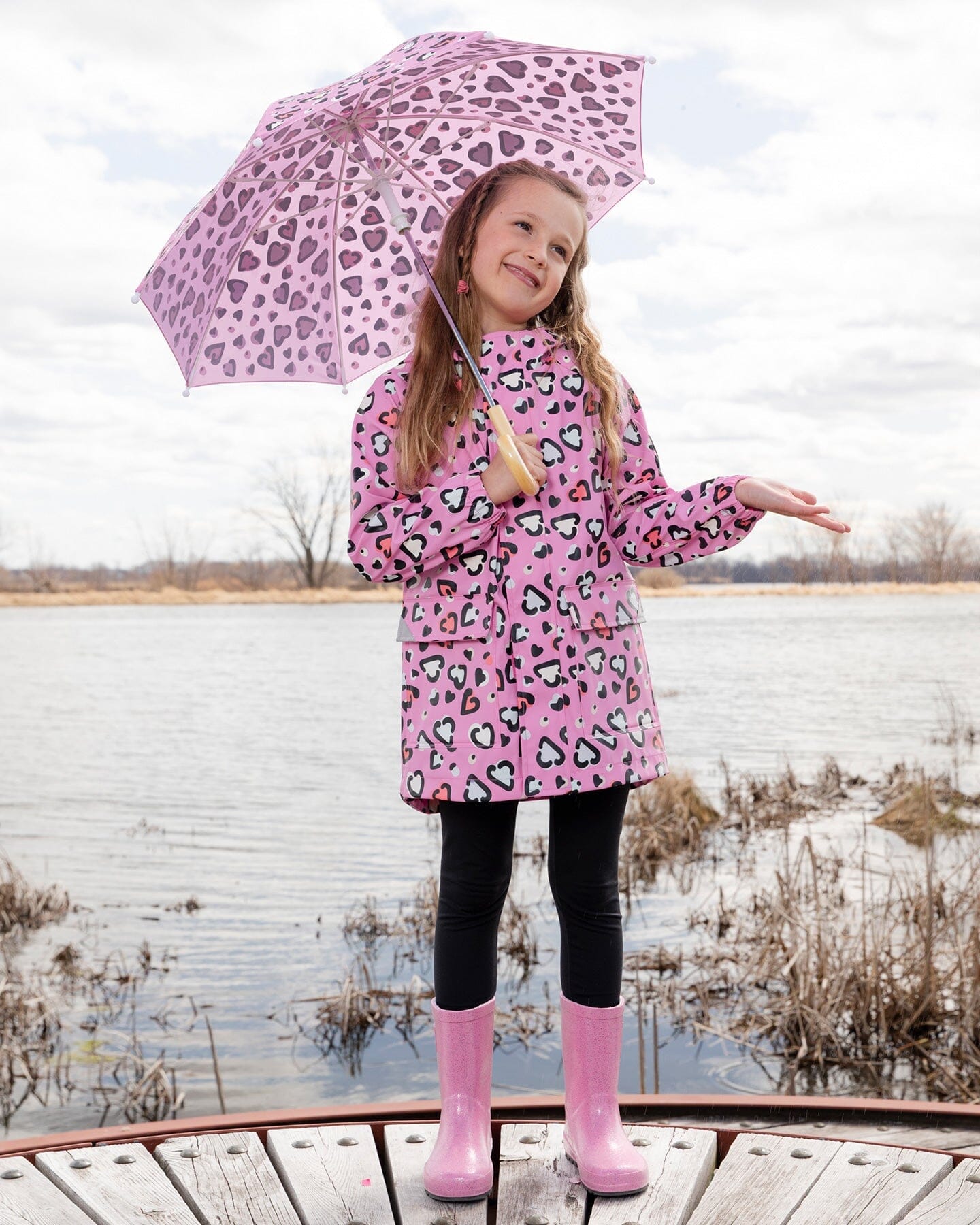 Pink raincoat with color-changing hearts