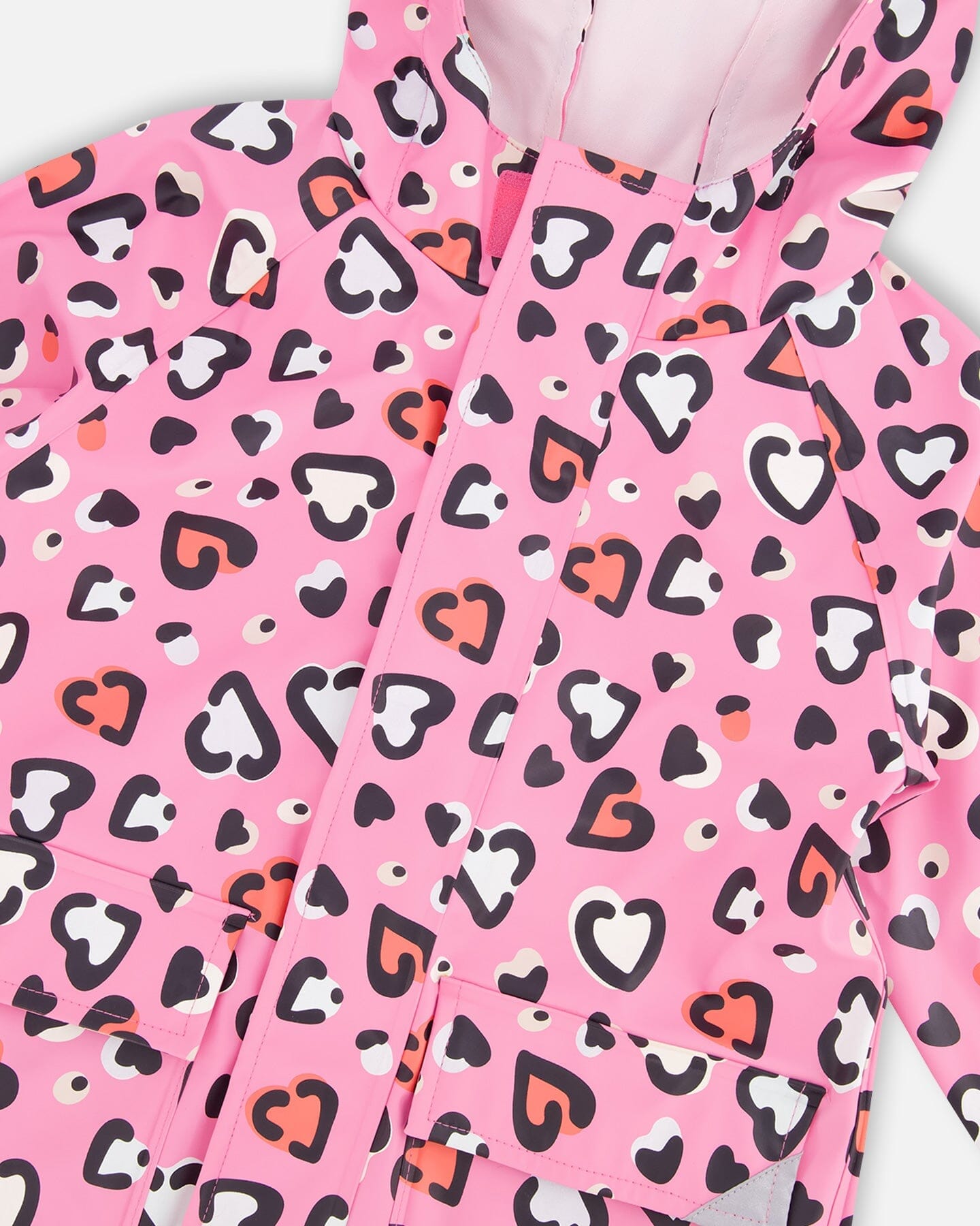 Pink raincoat with color-changing hearts