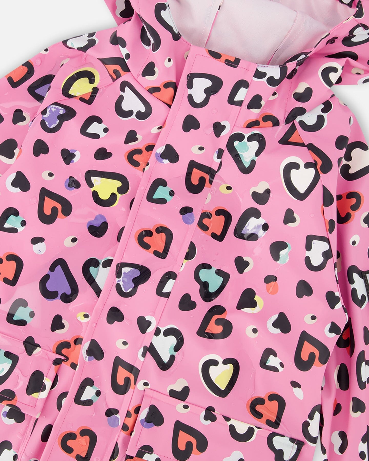 Pink raincoat with color-changing hearts