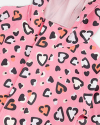 Pink rain jumpsuit with color-changing hearts print