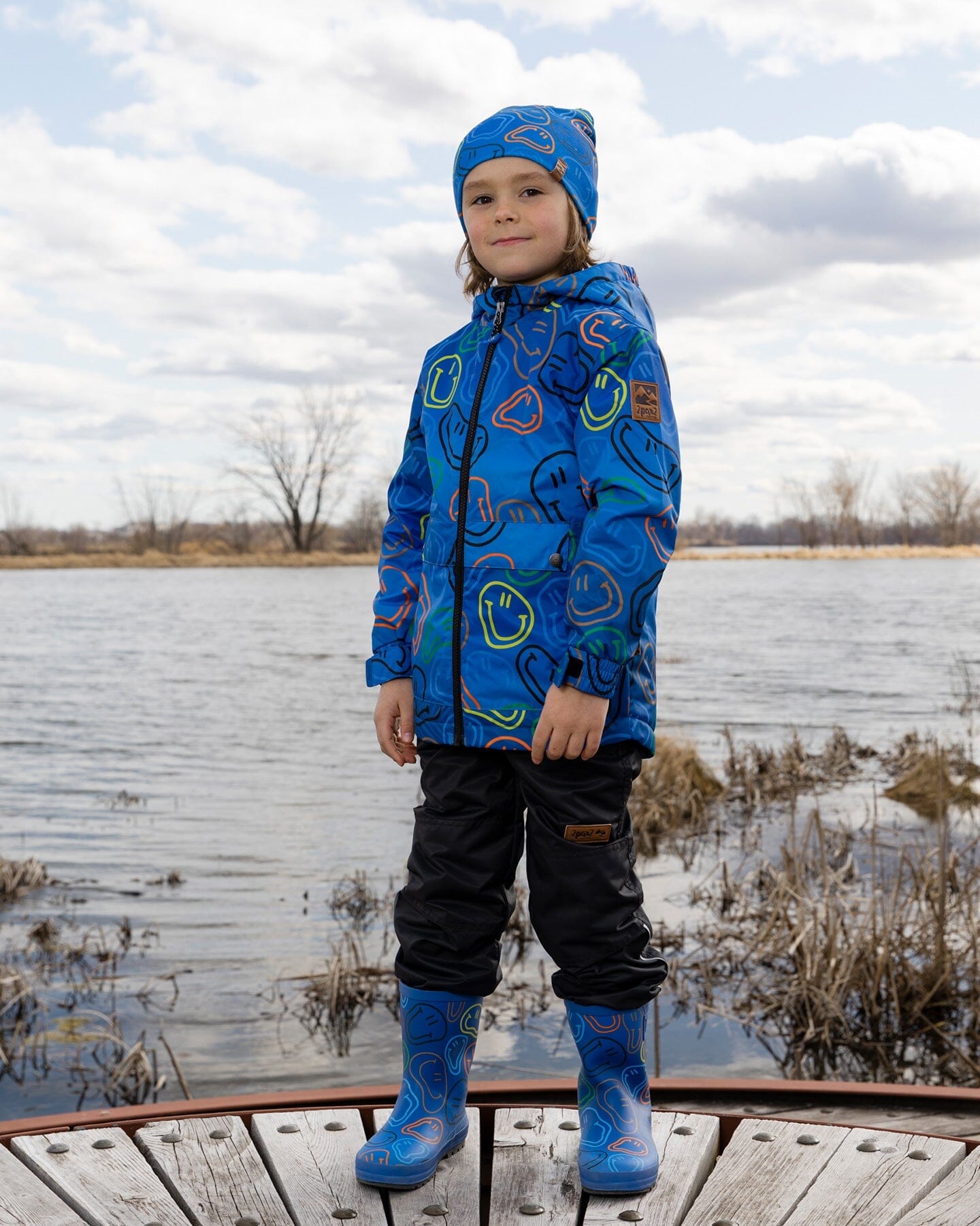 Rain Boots In Natural Rubber Blue Smiley Print